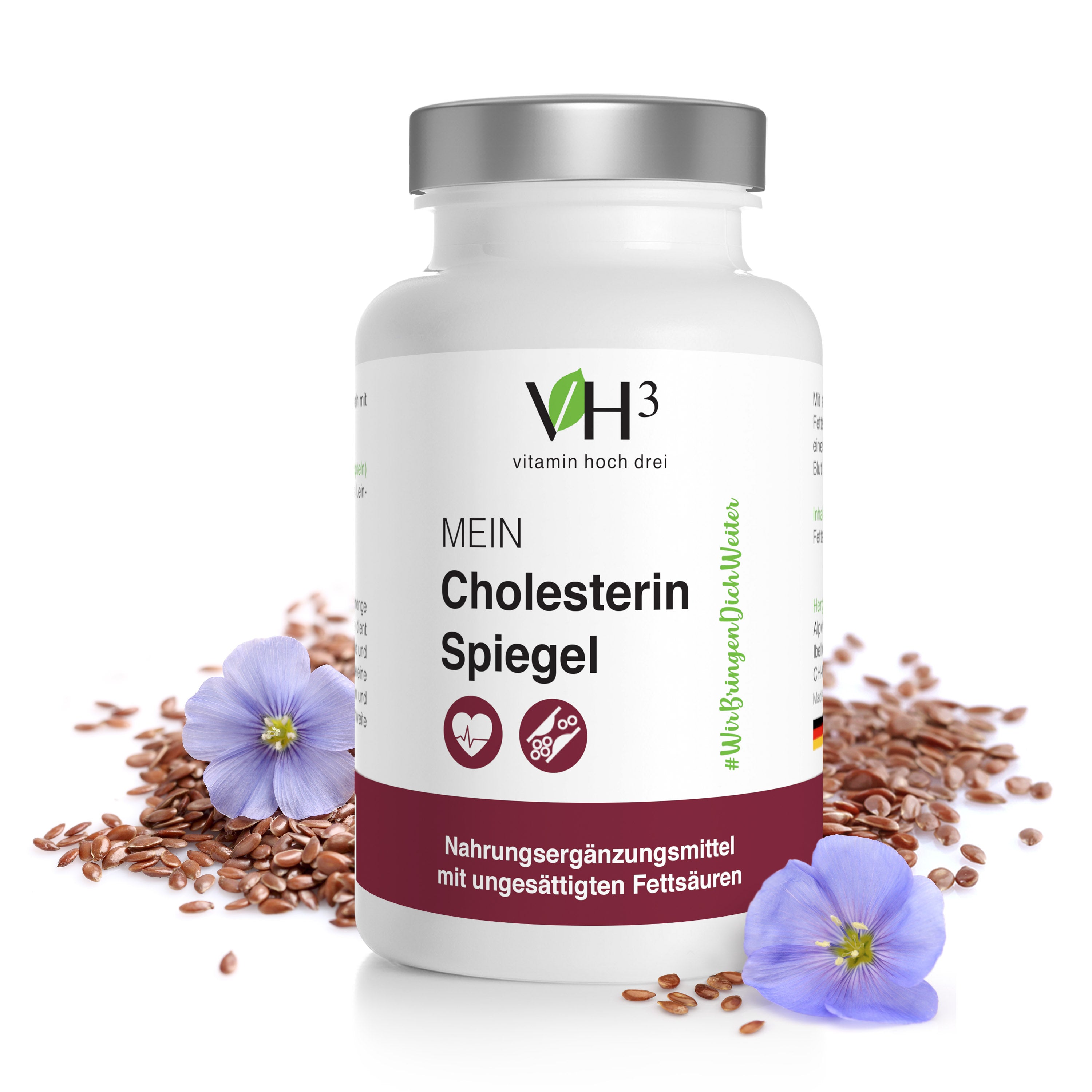 Zu sehen ist das Produkt VH3 Mein Cholesterinspiegel und die Inhaltsstoffe wie Leinsamen liegen in natürlicher Form um die Dose herum